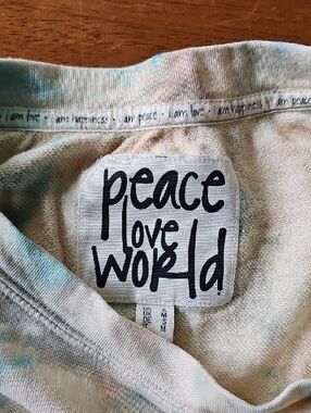 Peace Love World Women's Tie-Dye Sweatshirt in Pastel Blue and Cream